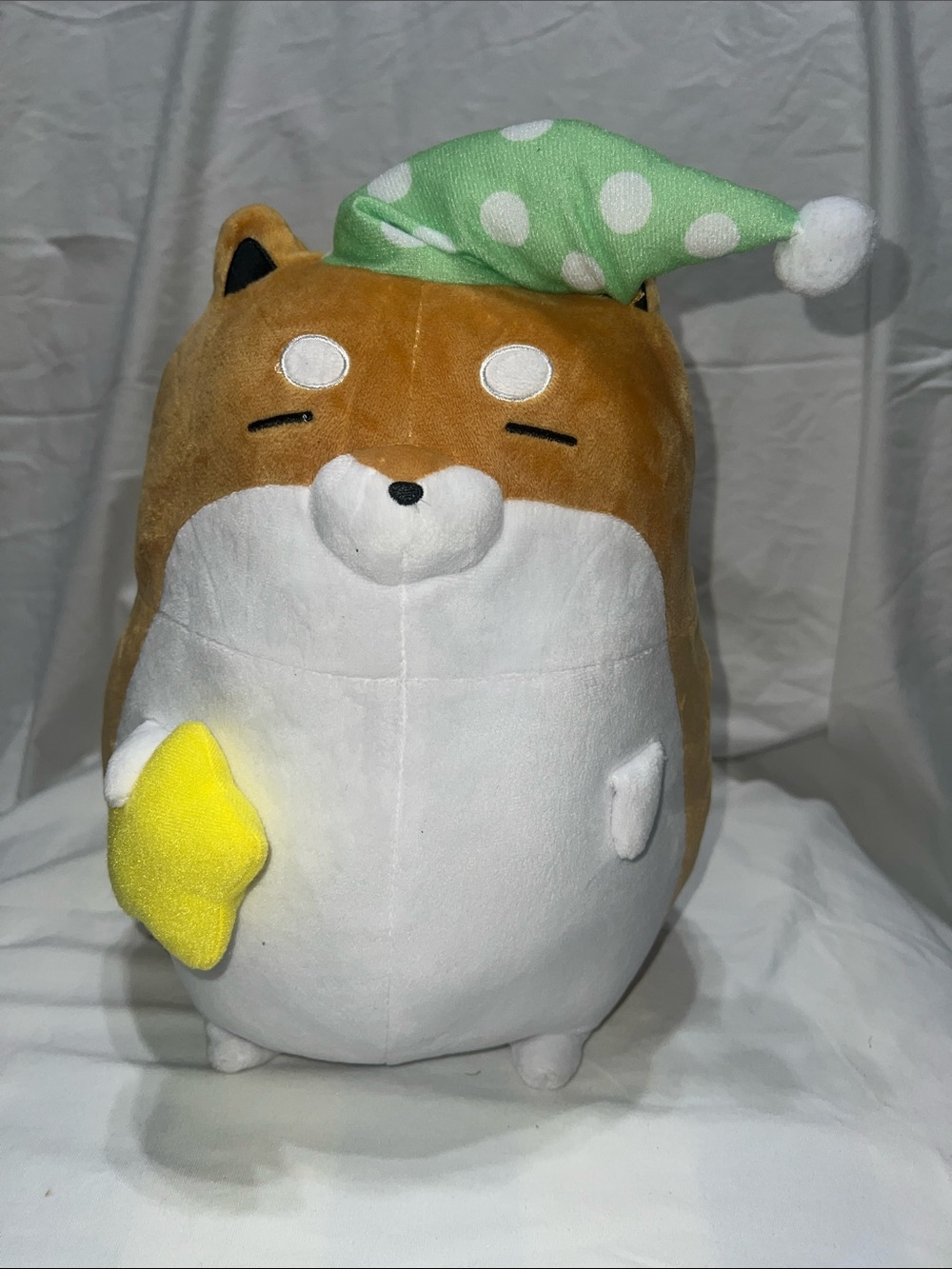 Sleepy Shiba Plush Toy with Green Polka Dot Nightcap and Yellow Star